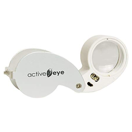 Photo of pocket sized Active Eye loupe magnifying glass, with fold out protective case