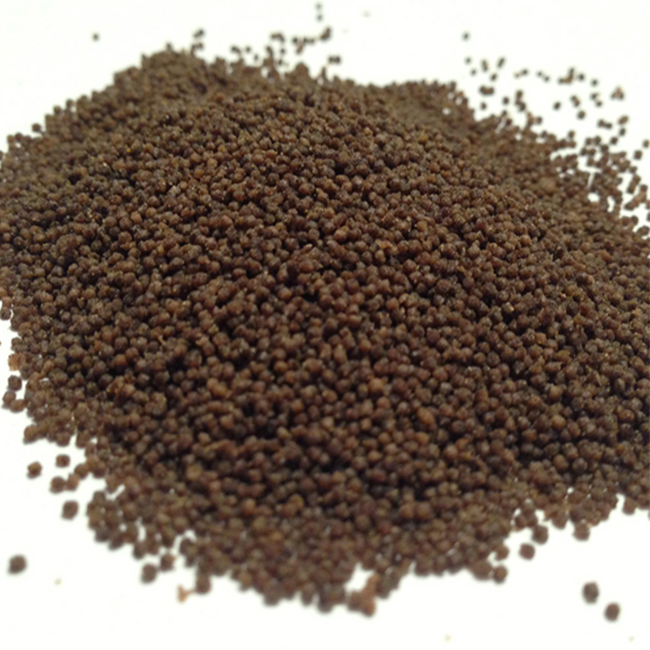 Closeup photoe of Stage 2 AquaNourish Fish Food pellets on white background