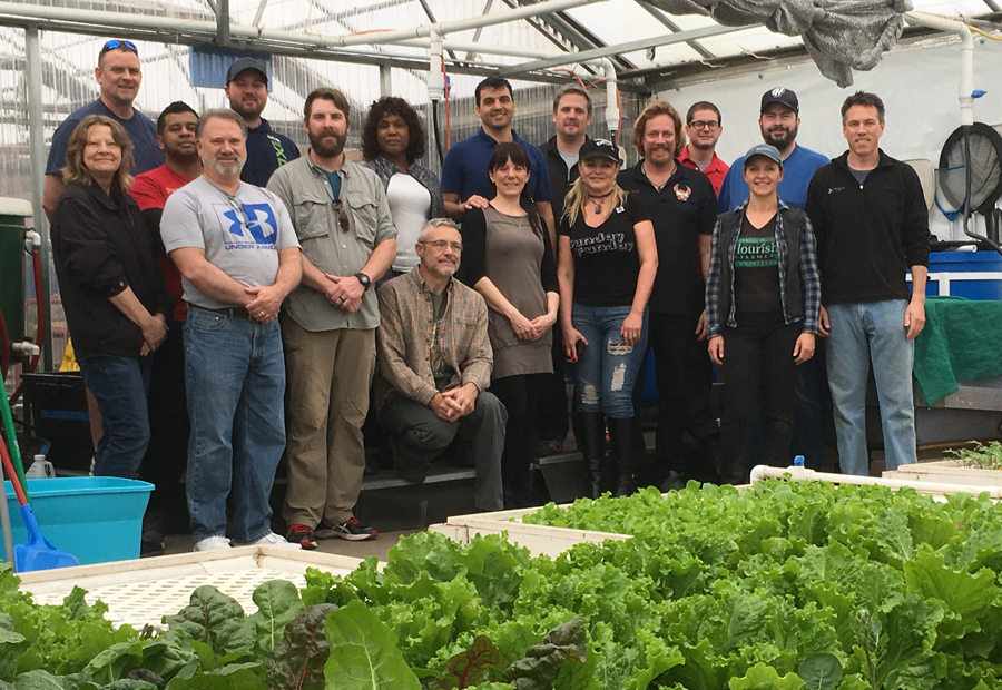 aquaponics class picture in greenhouse