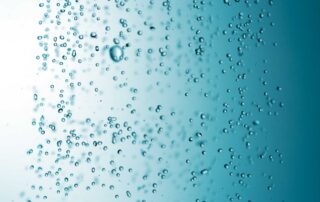 small water bubbles floating upwards